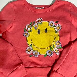 It is a little cute cropped crew neck for girls.